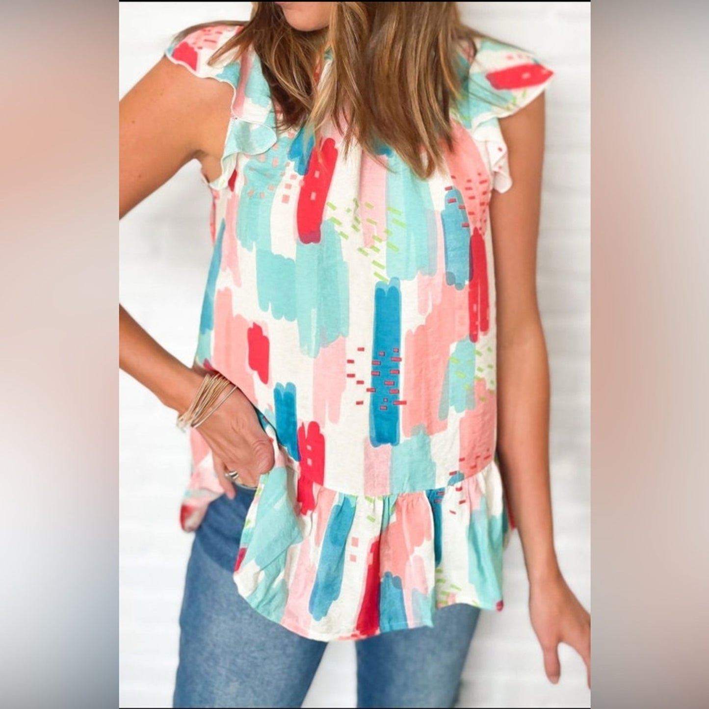Luna colorblock ruffled mock neck blouse