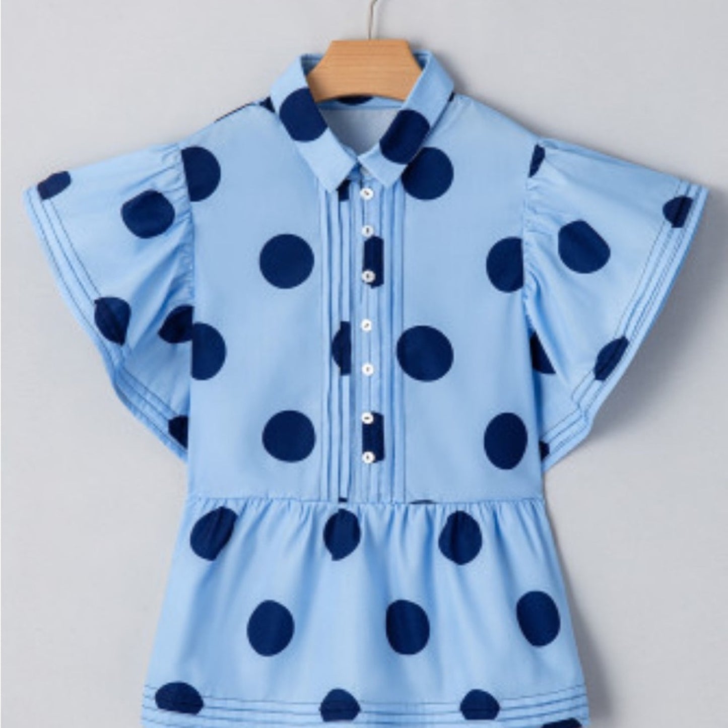 Hollie polka dot ruffled peplum top