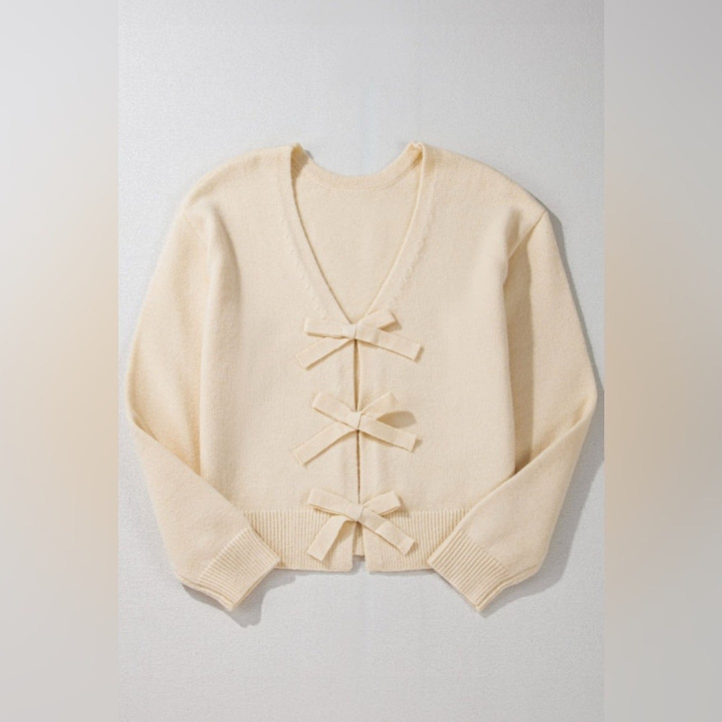 Simone jet stream bowknot front loose V neck knitted cardigan