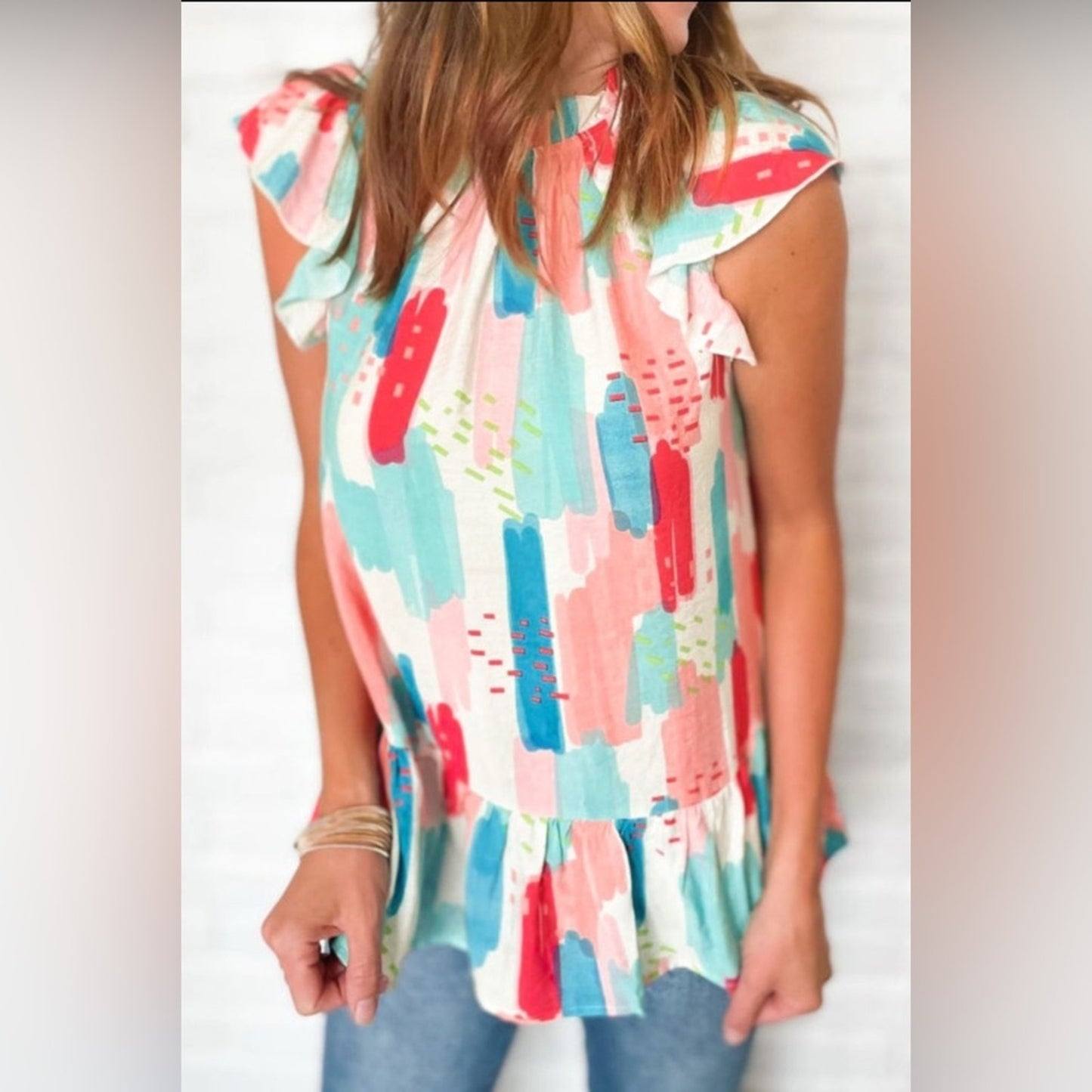 Luna colorblock ruffled mock neck blouse