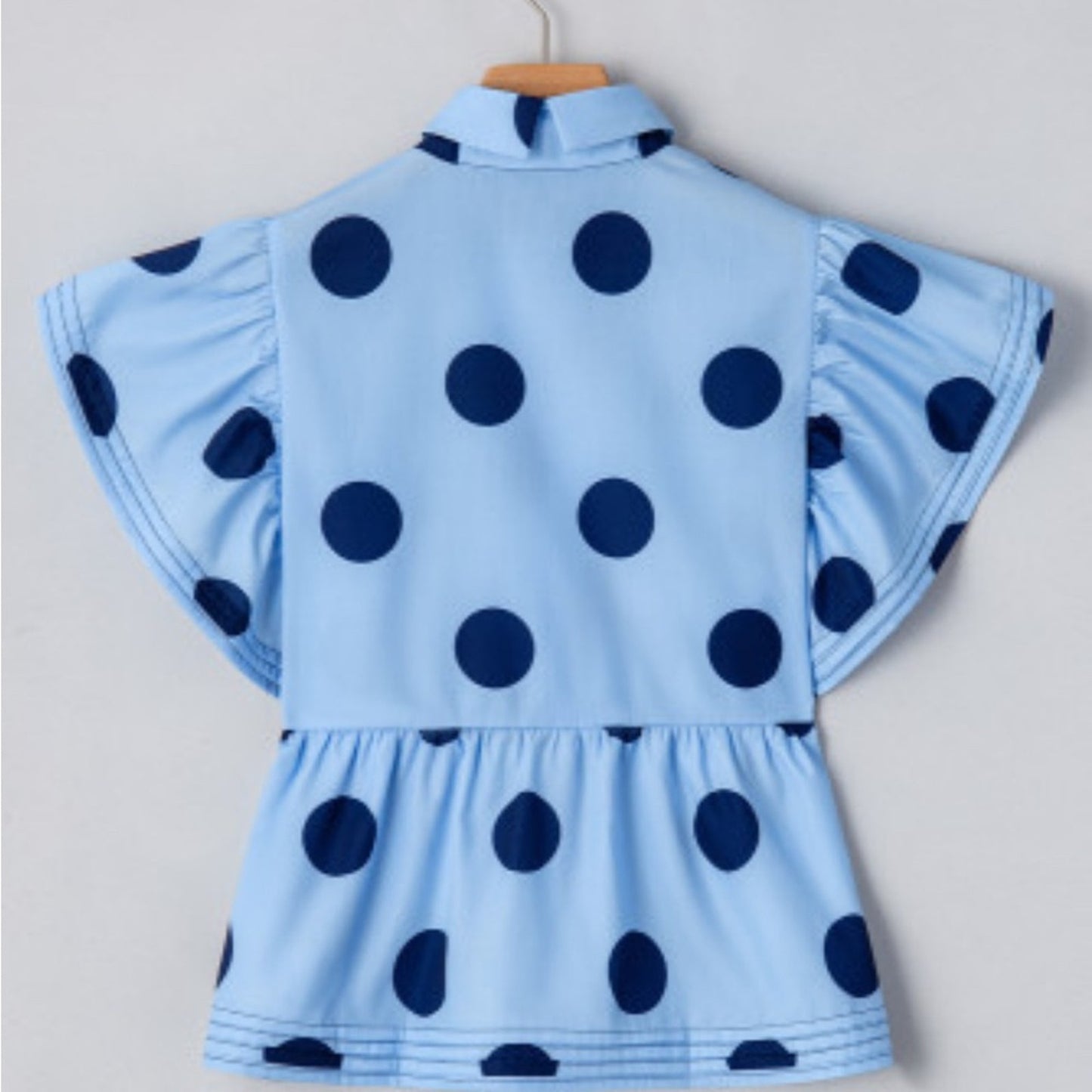 Hollie polka dot ruffled peplum top