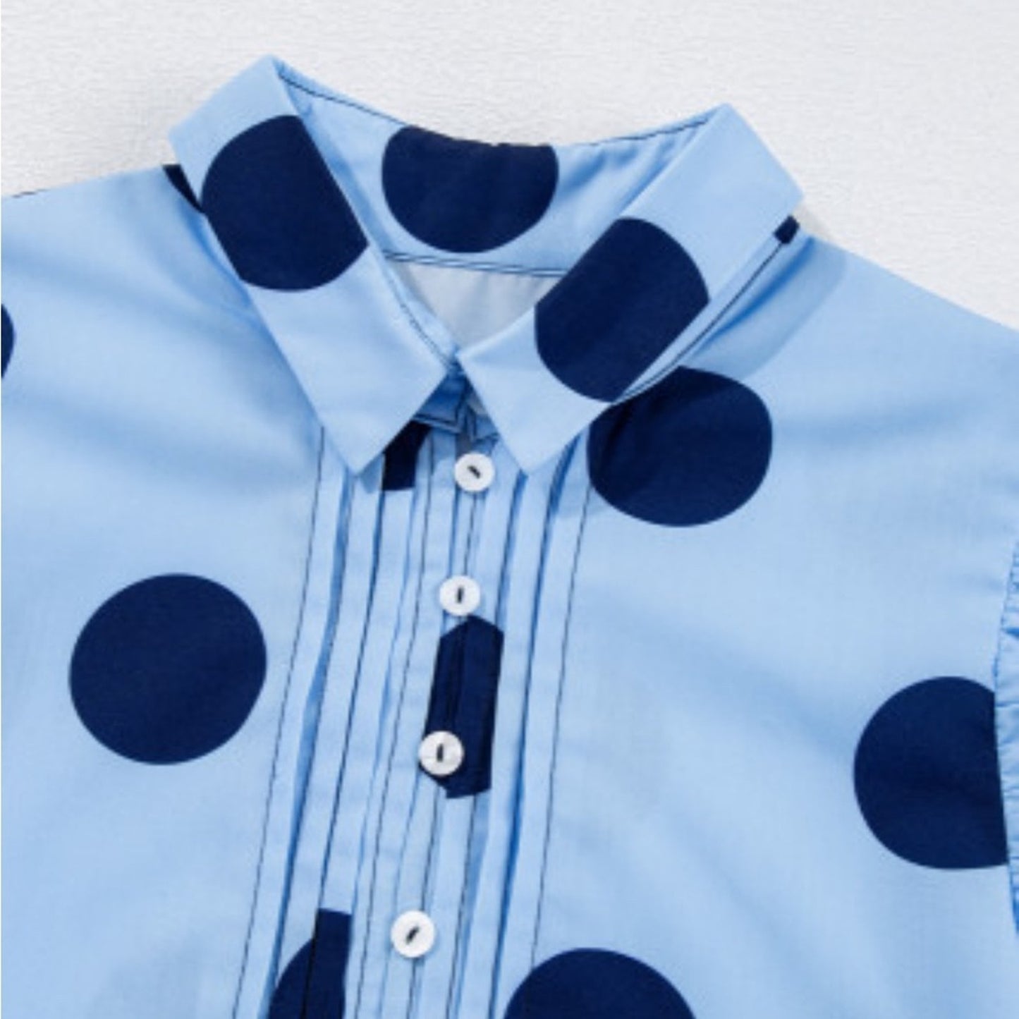 Hollie polka dot ruffled peplum top