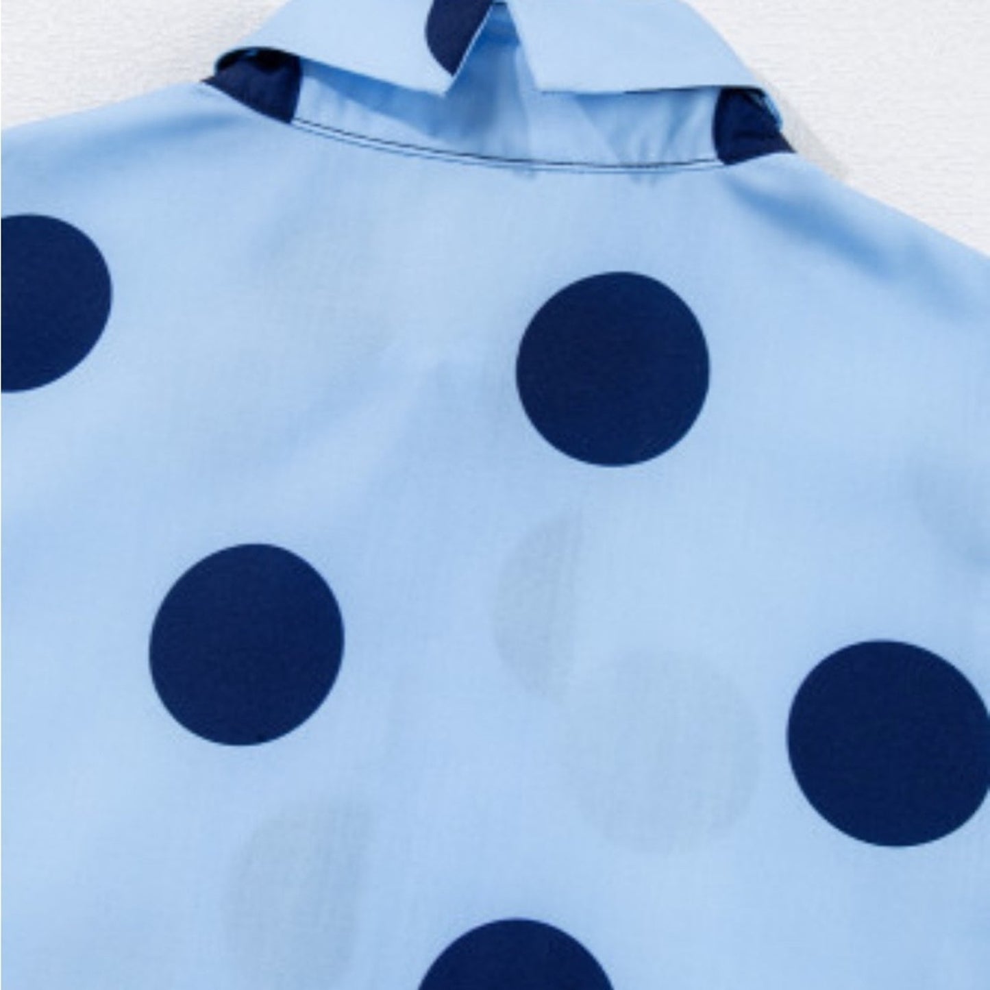 Hollie polka dot ruffled peplum top